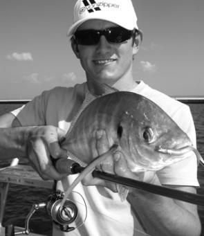 Tim with a solid trevally taken on a Squidgy Flick Bait just of the third runway late in the afternoon.